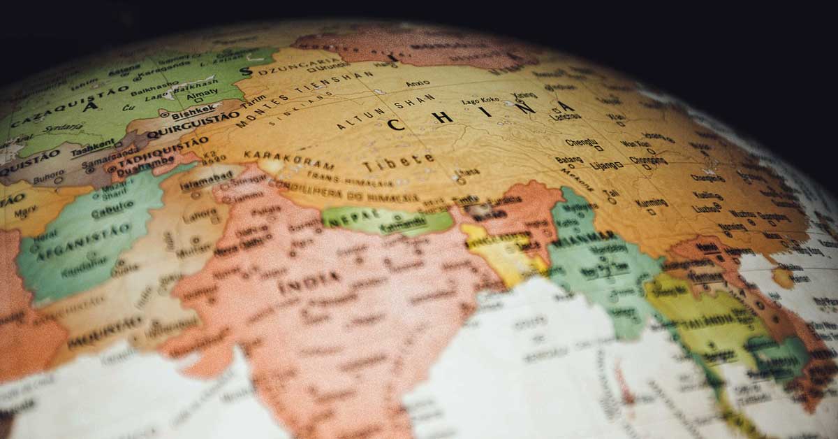 Close-up of a world map highlighting regions of economic, political, and military power across the globe. Photo: Lucas Wendt from Pixabay